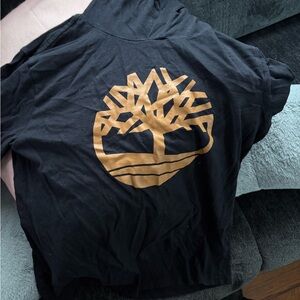 Timberland Black Tee with Gold Emblem